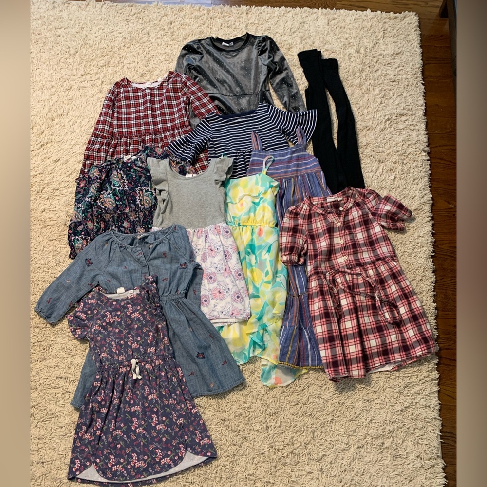10 girls size small dresses/2 pairs of black tights